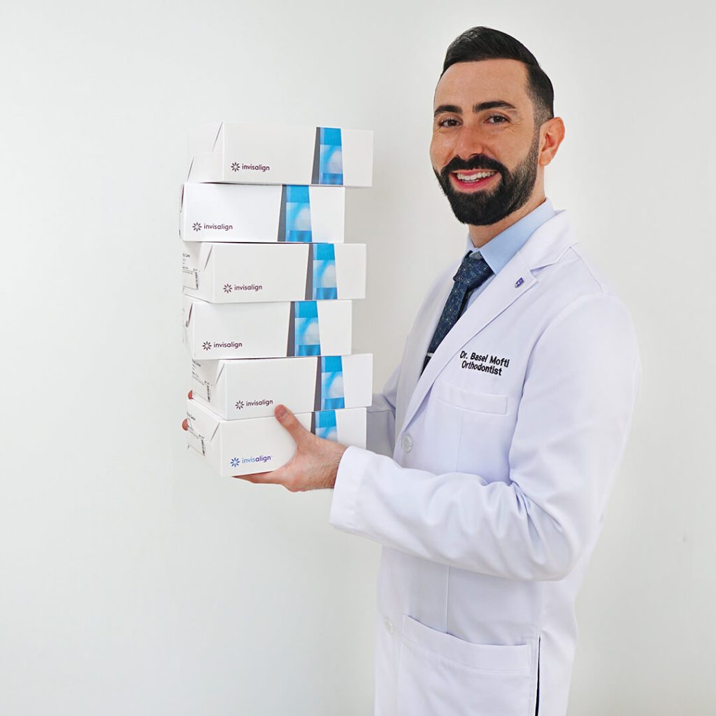 Certified Orthodontist working on Damon Braces in Dubai, Dr. Basel Mofti
