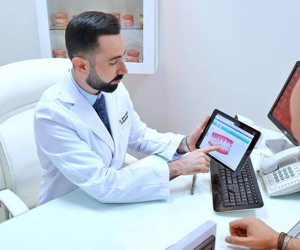 The best American orthodontist in Dubai, Dr. Basel Mofti